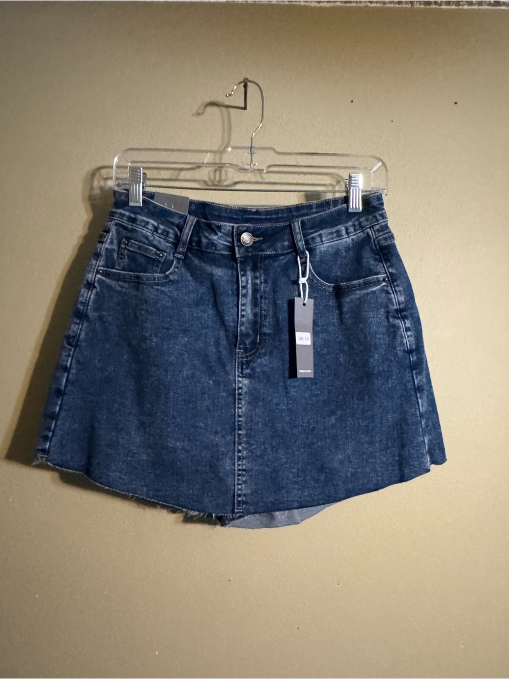 KDF High-waisted, dark denim, Women’s Size 10 Skirt in front & Shorts in back.